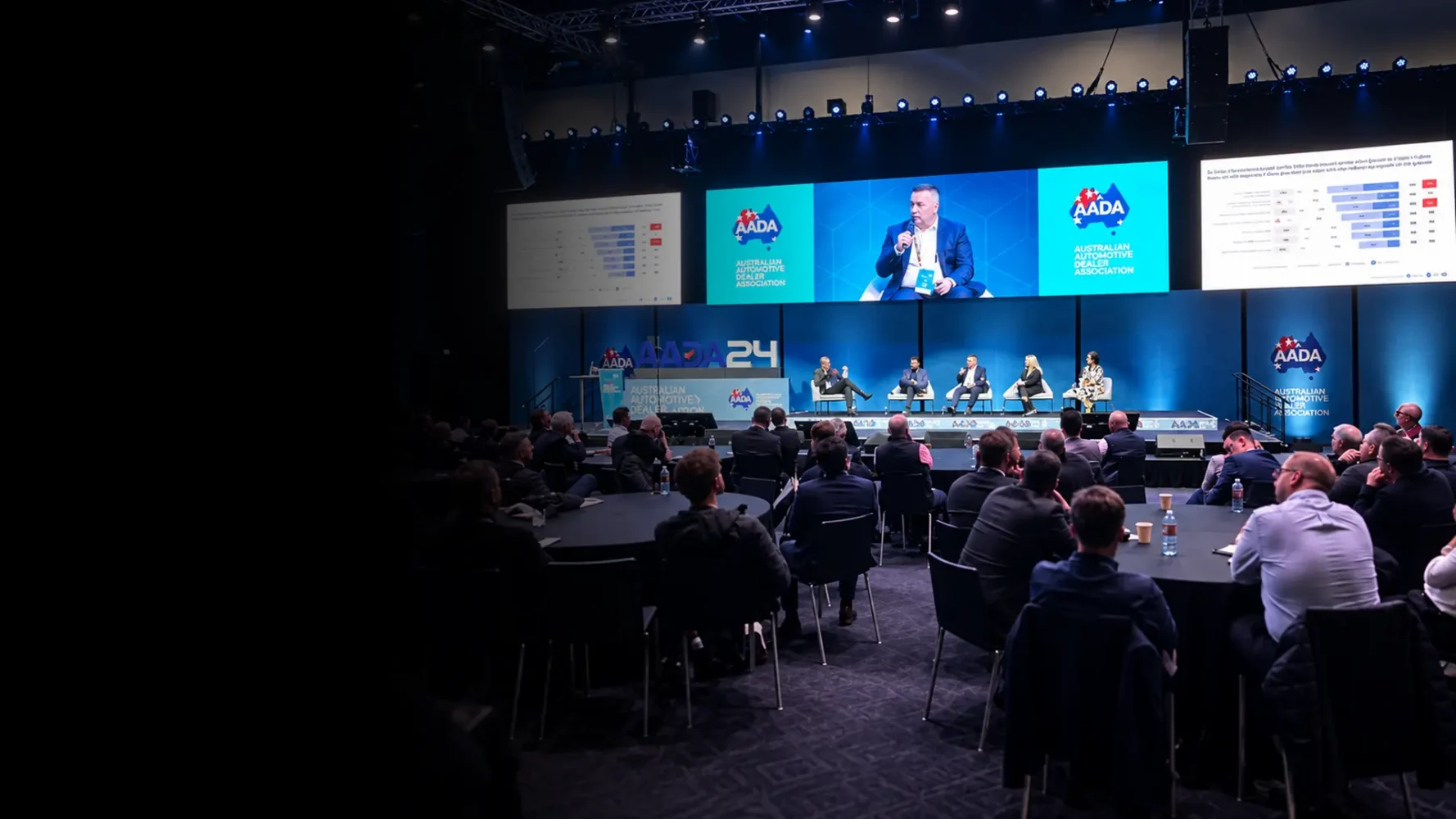 Conference AV hire for the AADA conference, featuring LED presentation screens, panel staging and professional audio.