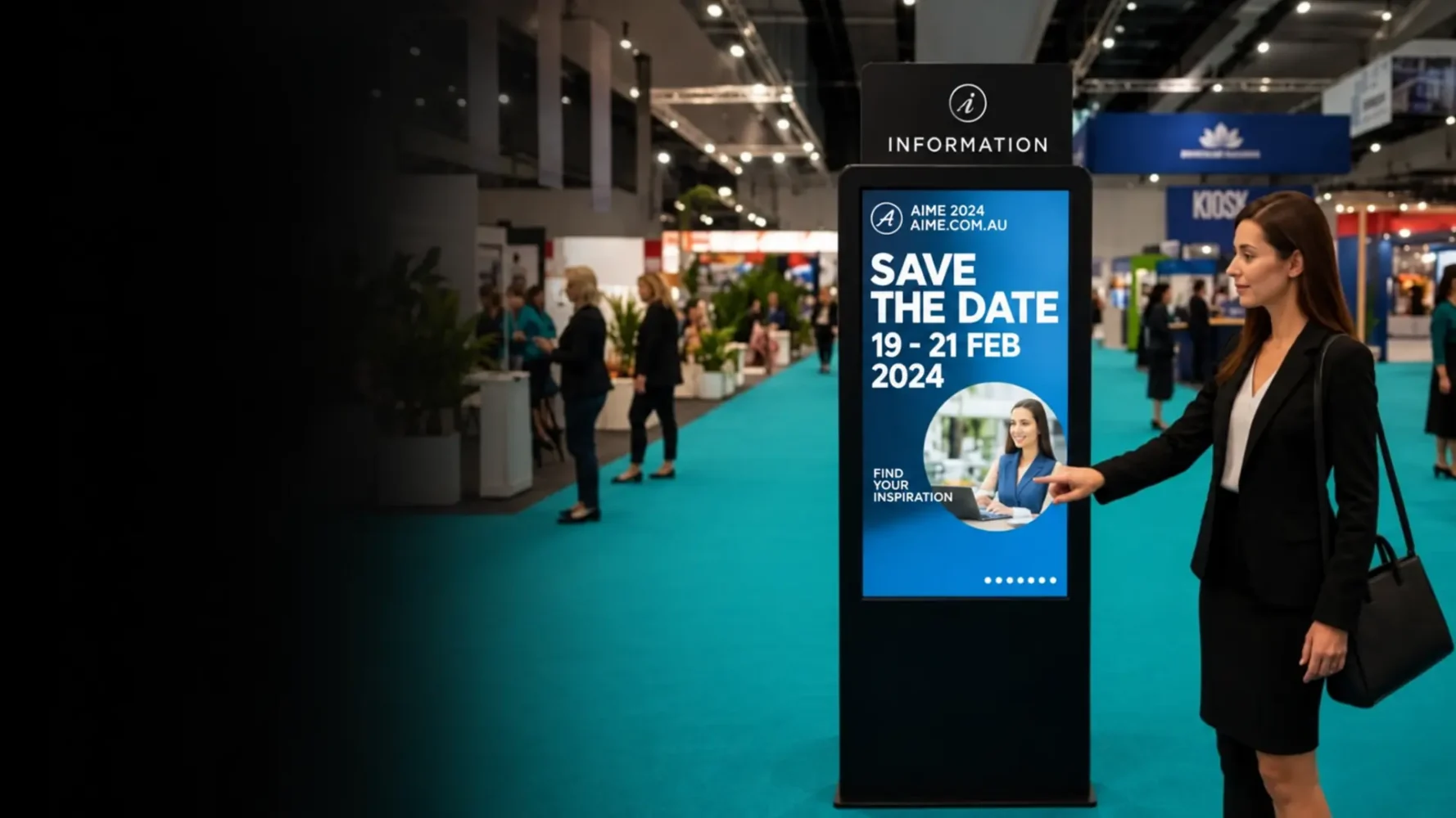 Touchscreen hire kiosk displaying event information as an attendee interacts with the screen at an exhibition